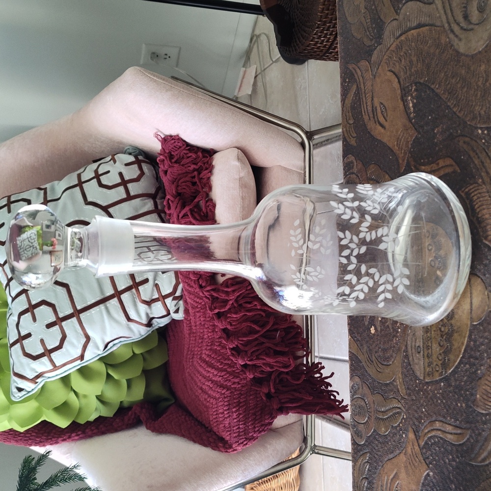 Vintage decanter with etched leaves and ground glass stopper